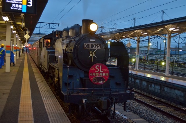 Steam locomotive parked on platform